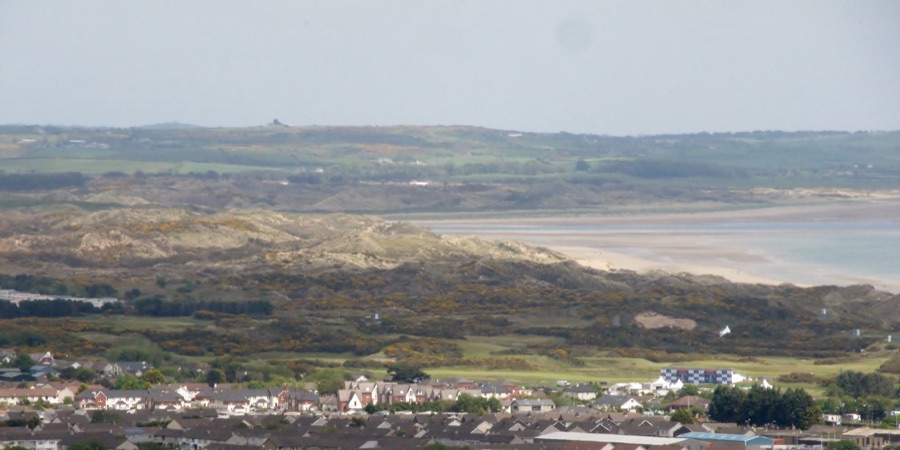 Over the dunes towards the course.